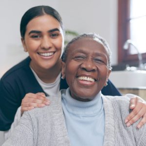 smile-healthcare-and-portrait-of-nurse-with-patie-Z43MB4C